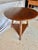 This 19th Century English Pine Cricket Table dates back to the late 1800's. The piece fetures a round planked top resting...