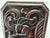 A beautiful, antique relief carving made of solid wood (likely walnut). The piece features a charming and rare motif of a...