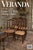 A set of four French provincial dining chairs featuring carved wooden frames with curved crest rails centering a shell...