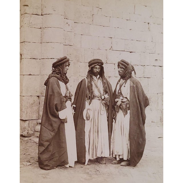 An antique albumen photo of Middle Eastern men, circa 1870.