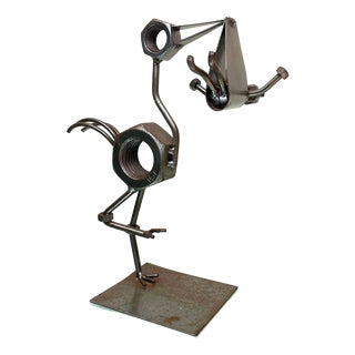Folk Art Steampunk Welded Metal Stork and Baby Figurine For Sale