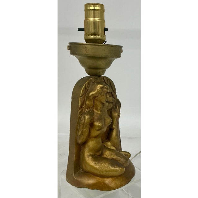Pretty 1940s vintage gold finish plaster boudoir table lamp in the shape of seated nude and a faun. 5.25. Charming vintage...