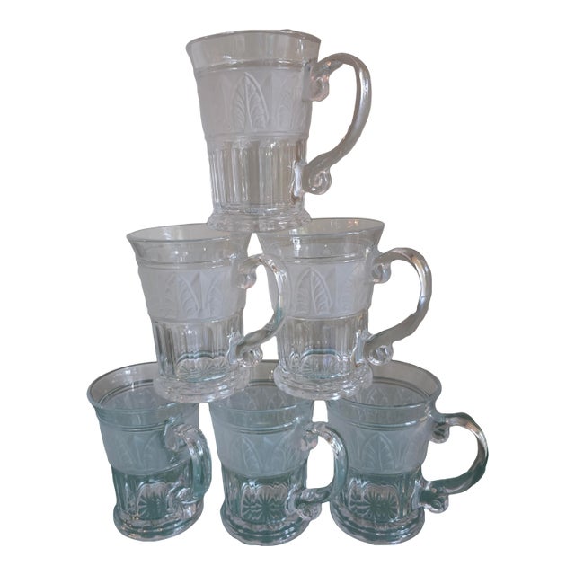 Athens glass crystal clear mugs have a raised satin band of Acanthus Leafs inspired by the Art Deco aesthetic. They are...