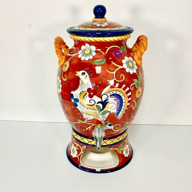 This lovely ceramic Beverage Dispenser is perfect for both cold and hot drinks. The raised stand will keep the...