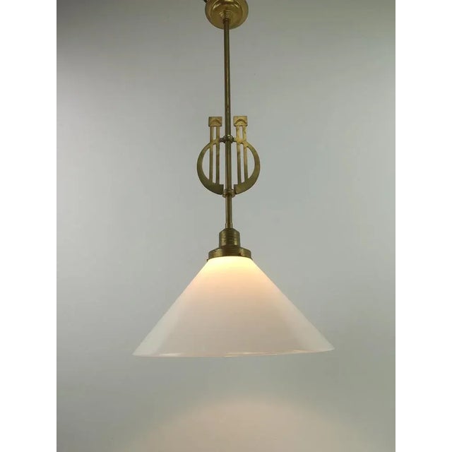 Solid brass ceiling lamp with overfucking glass The lamp gives a cozy non-dazzling light. Surface polished. Re-electrified...