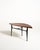 Teak coffee table with a distinctive asymmetrical top and black lacquered wooden frame. Yngve Ekström for Westbergs...