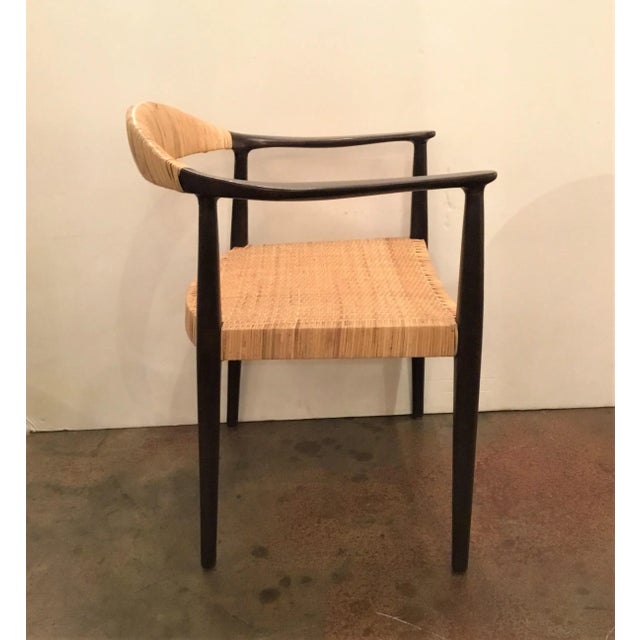 Unique Bungalow 5 Mid-Century Style teak and caning accent chair, showroom floor sample