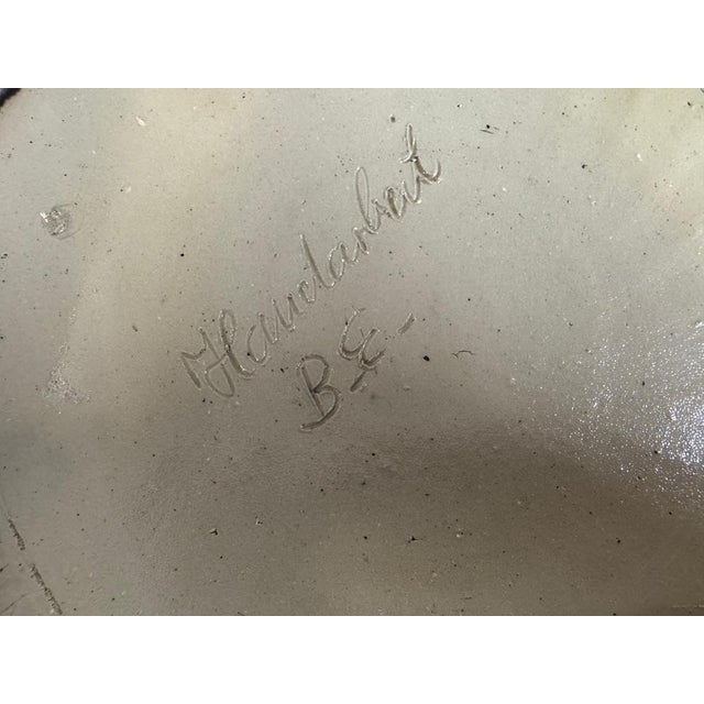 A substantial Belgian ceramic jug vase dating from the 1970s, characterised by its low, generous proportions and richly...