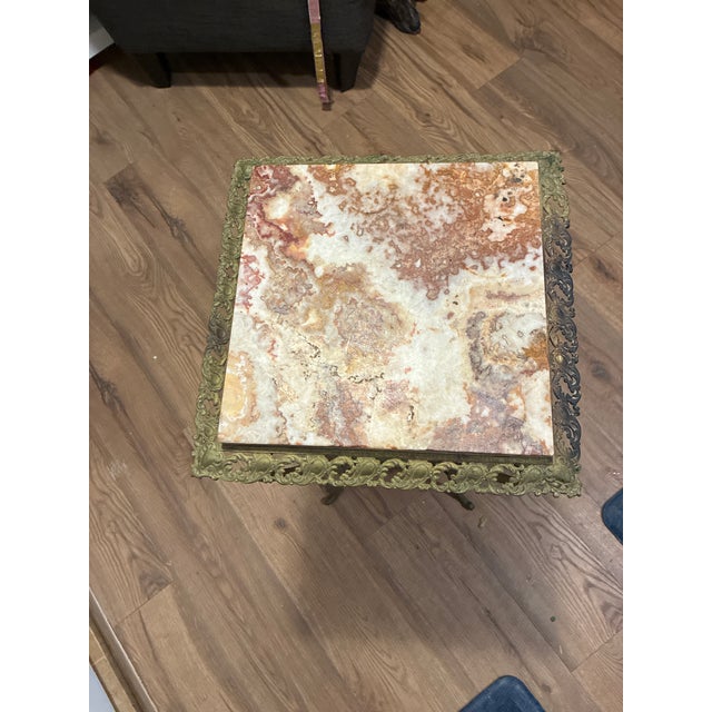 This is an Italian plant stand from the 1900s This has two beautiful marble shelves. I don’t see anything wrong with it...