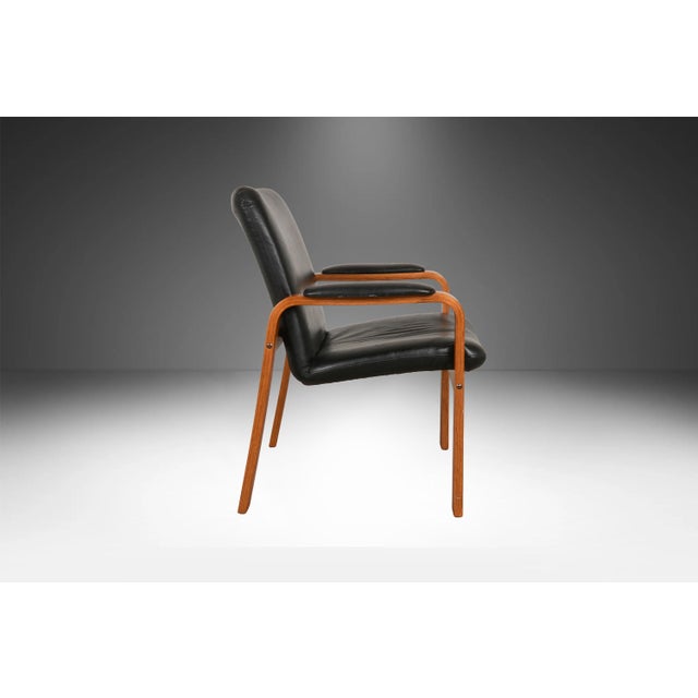 A gorgeous Danish Modern leather armchair manufactured in Norway by Ekornes, a name synonymous with comfort and quality....