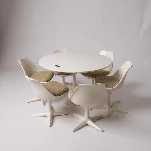 The Tulip dining set by Maurice Burke for Arkana is a striking mid-century modern suite designed to elevate your dining...