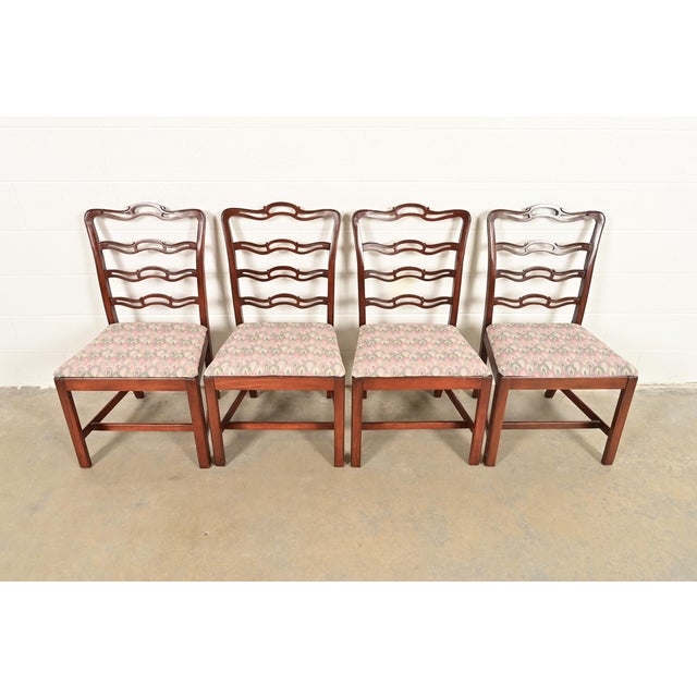A gorgeous set of four Georgian or Chippendale style side chairs or dining chairs In the manner of Baker Furniture USA,...