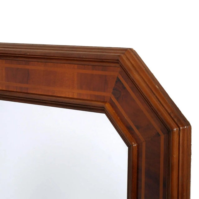 Elegant neoclassical mirror with octagonal frame in solid wood veneer walnut, with inlaid beech wood. two other identical...