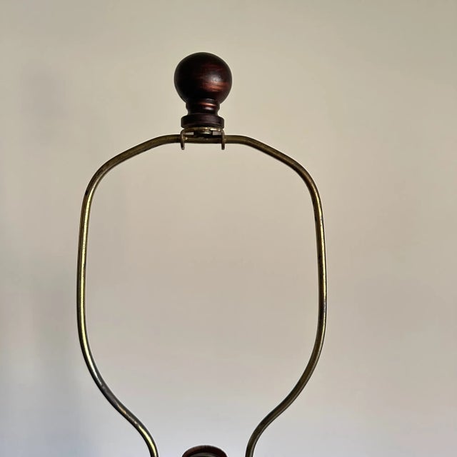 Frederick Cooper Chicago lamp featuring cut crystal body with brass and wood components. Very heavy piece! Small scuff...