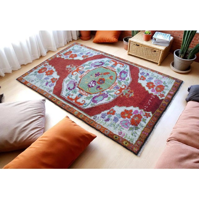 Add a touch of vintage charm to your space with this handmade 4x6 ft Turkish pile rug. Crafted from very soft wool on...