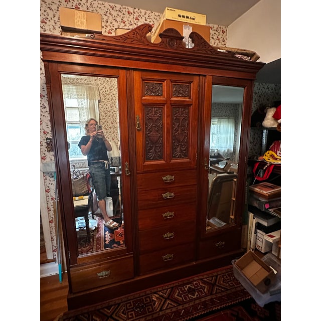 Late 19th Century Victorian Carved Walnut Triple Compactum Wardrobe With Beveled Mirror Doors For Sale In New York - Image 6 of 9