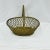 Mid Century hand woven brass basket. Marked Waccamaw, India. Measures 12” w x 10” d x 11” high.