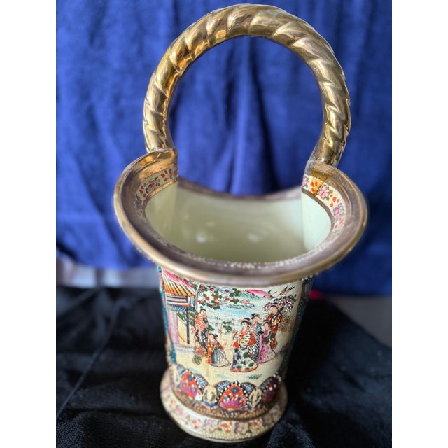 This exceptional antique Chinese Rose Medallion porcelain basket vase dates to the late Qing Dynasty, circa 1880–1900. The...