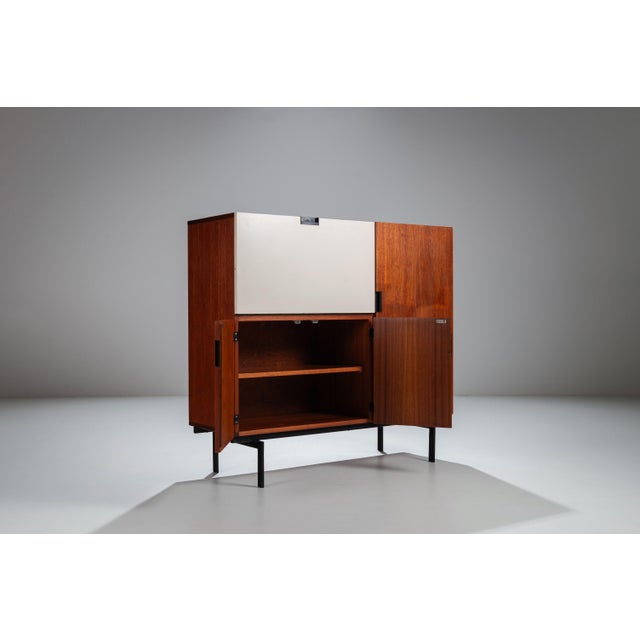This refined mid-century modern sideboard, model CU01, was designed by Cees Braakman for the renowned Dutch manufacturer...