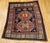 A rare and highly collectible example of 19th century Caucasian weaving, this square-format Kazak area rug from the late...