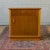 Handsome pair of French Mid-Century mahogany veneered nightstands, each featuring a drawer above a cabinet door fitted...