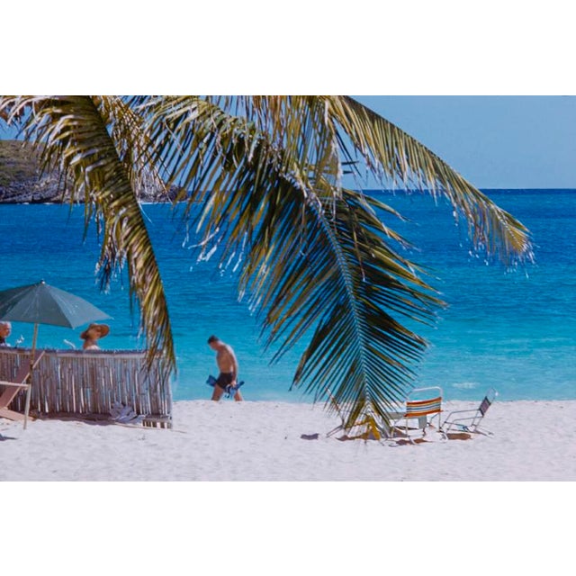 Beachside At The Mill Reef by Toni Frissell Visitors enjoy the sea and sun at the Mill Reef Club, Antigua, 1959. (Photo by...