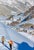 An Alpine Valley In Winter by Toni Frissell Two skiers look down into the valley at the St. Anton ski resort, Austria,...