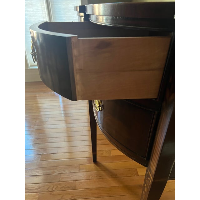 Offered is a solid wood, well crafted Hepplewhite sideboard by Drexel Heritage. This piece features brass hardware and...