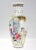 A fine Chinese Export porcelain vase. In a baluster form. Decorated with a painted scene of two men and two women in...