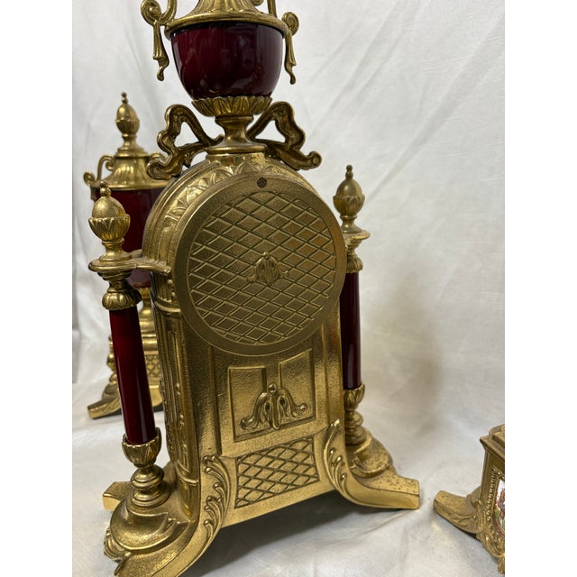 Vintage Imperial “Romeo & Juliet” Mantel Clock Garniture Set featuring a central working mantel clock flanked by matching...