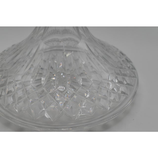 This is a stunning Irish cut crystal decanter. It has a sterling silver collar. Markings: three icons meaning it is from...