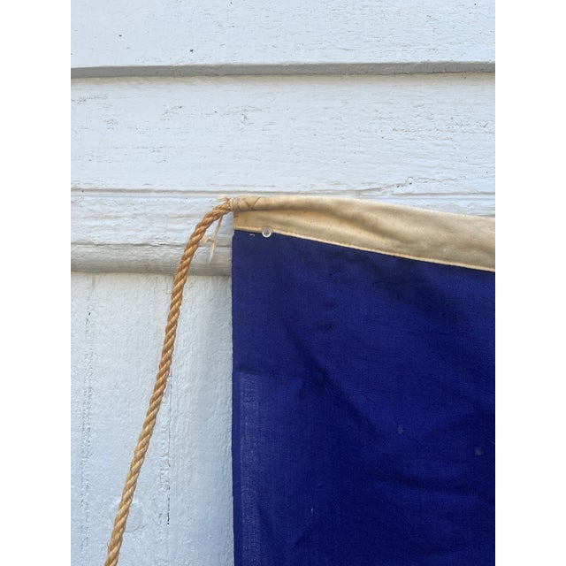 Vintage flag of sewn wool bunting in original vibrant colors