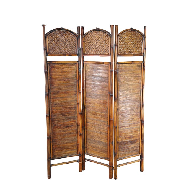 3 panel room divider made from bamboo, interlaced rattan and split reed. A warm addition to any space. Dimensions: 17" x 1...