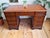 Introducing a magnificent vintage writing desk exuding the timeless elegance of Georgian style. Crafted in the 1980s, this...