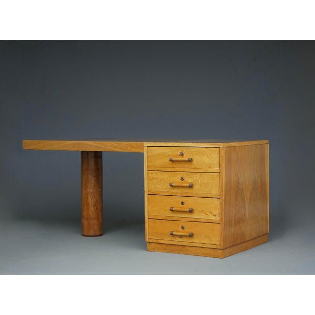 A quality French Art Deco, freestanding /double-sided desk. Executed in the 1930s by a unknown maker , this desk has all...