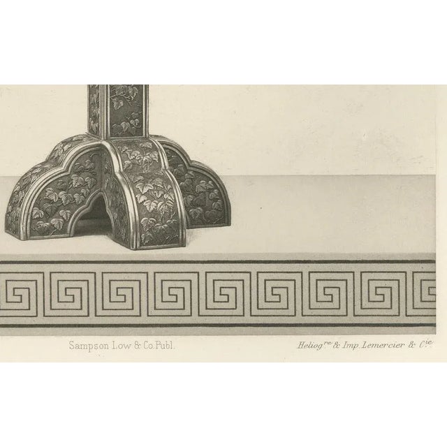 Title: rooster on an ornamental drum – plate ii from section vi of g. A. Audsley’s decorative masterpieces : this...