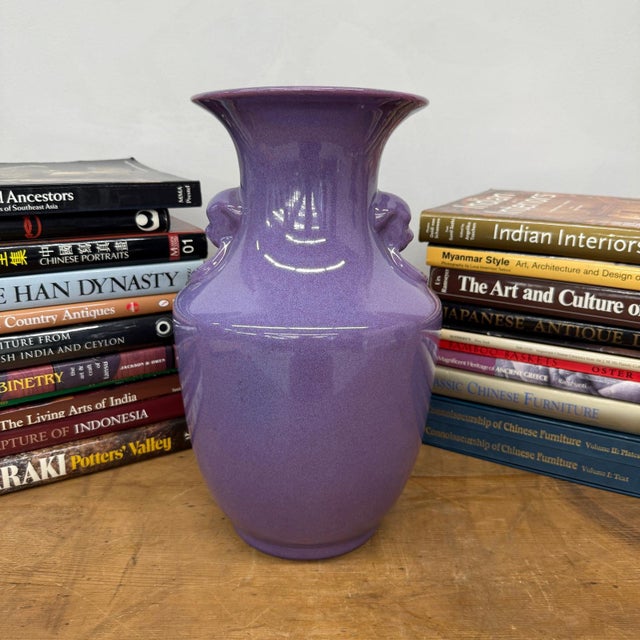 "About This Piece About This Piece This vase radiates a captivating presence with its velvety lavender glaze, shimmering...