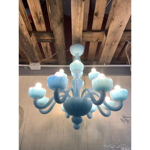 Contemporary Murano glass chandelier decorated in matte light-blue colour which makes it extremely modern and luxurious....
