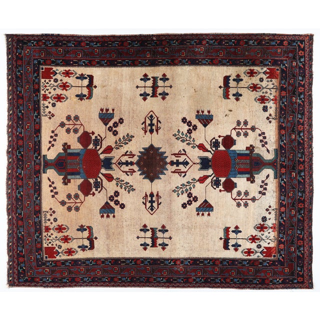 Vintage Persian Medallion Rug with Floral & Geometric Motifs – 4' x 6' This exquisite vintage Persian rug features a...