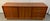 Stunning mid-century modern Danish teak wood dresser featuring eight spacious drawers and timeless Scandinavian design....