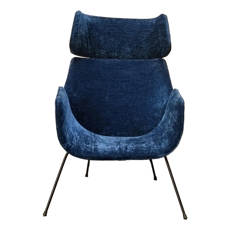 Blue velvet chair with black metal legs