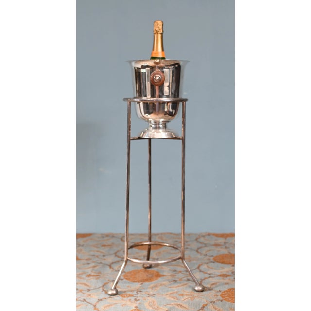 Vintage silver-plated champagne cooler with stand, a classic piece of entertaining ware designed for elegant dining or bar...