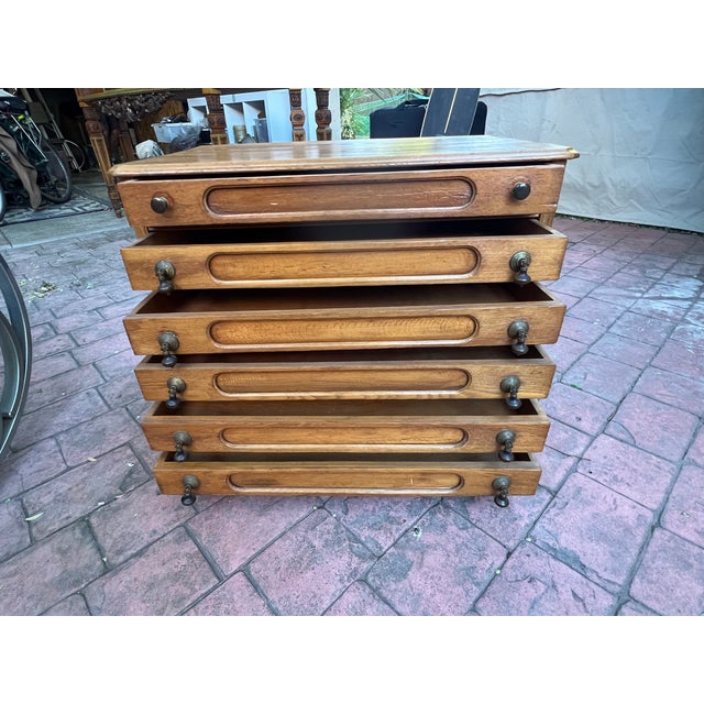 Antique spool cabinet with brass handles & 6 drawers. This beautiful cabinet is in original condition and constructed...