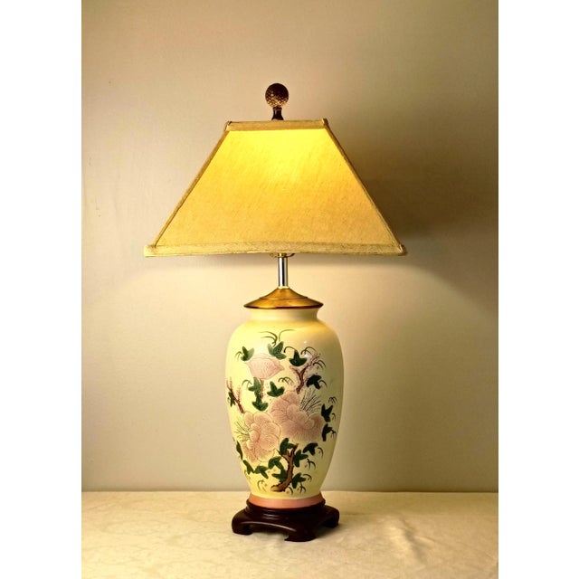 This Chinoiserie porcelain ginger jar table lamp introduces an authentic East Asian aesthetic and romantic color palette...