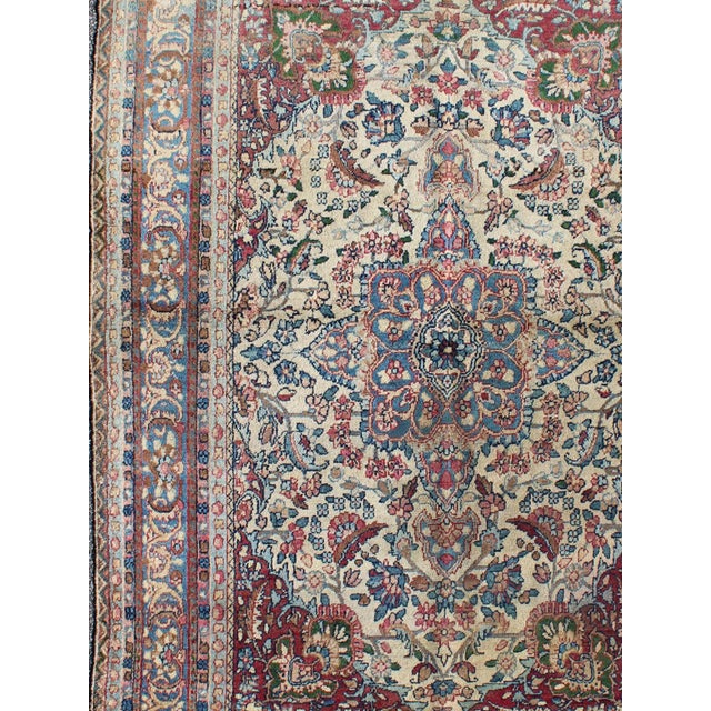 Traditional Detailed Antique Lavar Kerman Rug With Floral Design in Ivory Background For Sale - Image 3 of 7