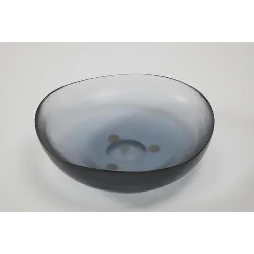 Large bowl-shaped glass with grindstone surface, blue colour. Venini production Period 1960 ca. Dimensions Diam. 29.7 – H....