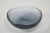 Large bowl-shaped glass with grindstone surface, blue colour. Venini production Period 1960 ca. Dimensions Diam. 29.7 – H....