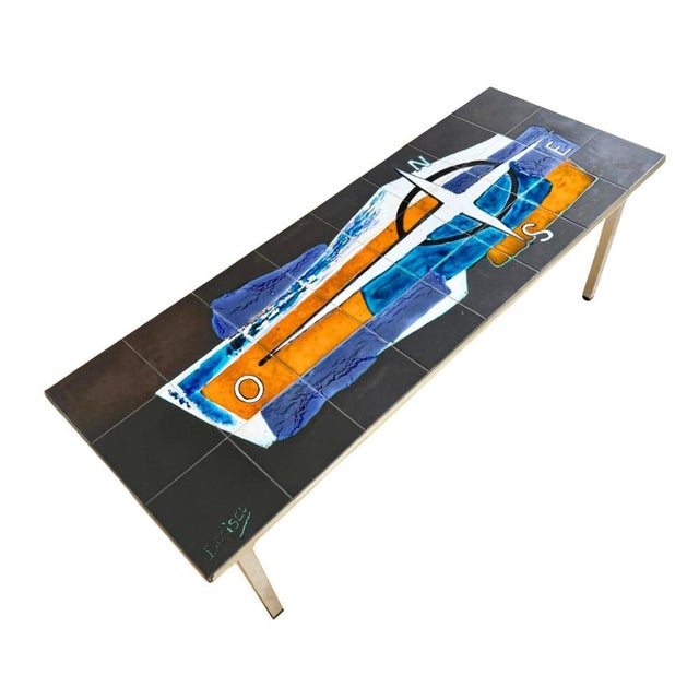 Vintage mid-century modern Space Age coffee table designed by Antonio De Nisco. Manufactured in Belgium. Features a steel...