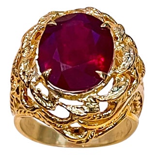5 Carat Treated Oval Ruby 14 Karat Yellow Gold Cocktail Ring For Sale