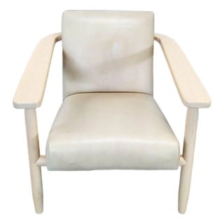 Four Hands Arnett Modern Lounge Chair With Light Wood Frame and Cream Leather Upholstery For Sale